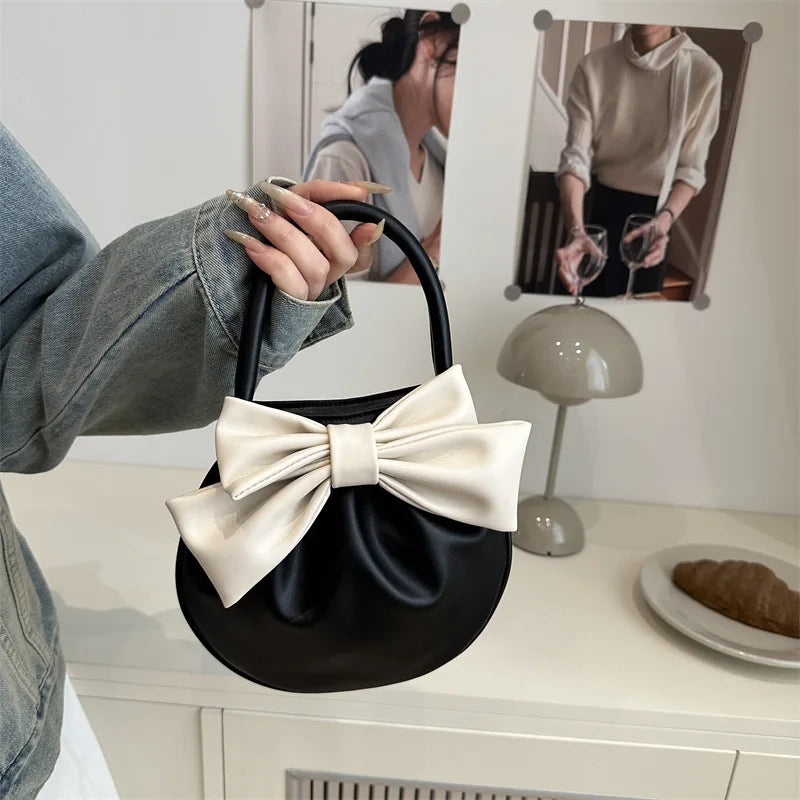 Bow Solid Compact Women Handbag