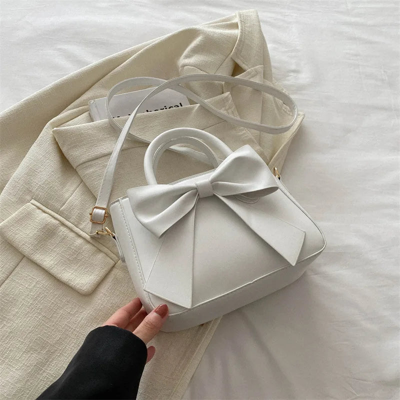 Black Bow Handbag with Gold Hardware