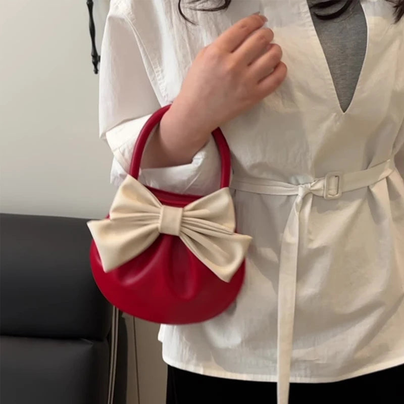 Bow Solid Compact Women Handbag