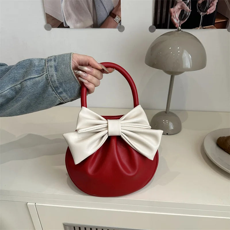 Bow Solid Compact Women Handbag